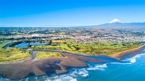 Aerial View On Taranaki Coastline With A Small River And New Plymouth