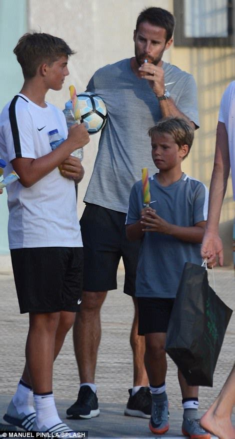 Has approached a representative for. Shirtless Jamie Redknapp plays football with sons | Daily ...