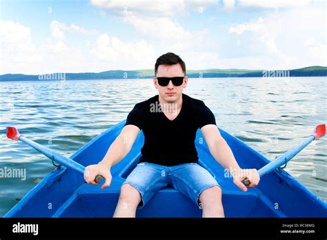 Stylish Young Man Portrait With Sunglasses Boat Ride On A Summer Day