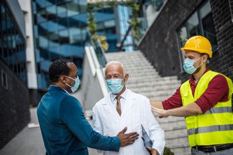 Business Man Doctor And Engineer Talking On Street Stock Image Image