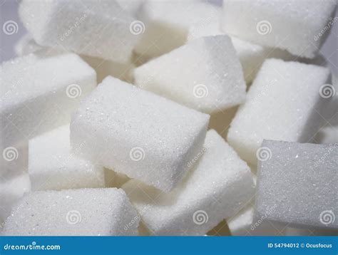 A Pile Of Sugar And A Chart Made Of Sugar Lumps Pieces Stock Image