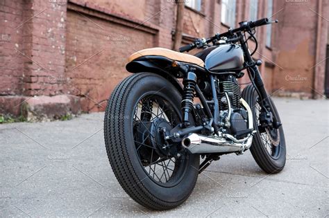 Cafe Racer Motorcycle On Parking High Quality Sports Stock Photos