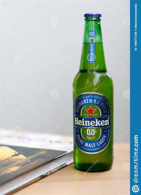 Green Glass Bottle Of Heineken Beer And Book Editorial Photo Image Of Color Alcohol 196072186