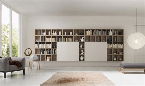Entire wall having a wall unit that is large enough to take an entire wall makes a huge statement in the room, this is the perfect option for the trendsetter that wants to make a huge statement. Contemporary Living Room Wall Units And Libraries, Ideas