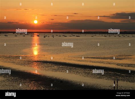 Sunset At Sandbanks Dorset Looking Across Poole Harbour Stock Photo