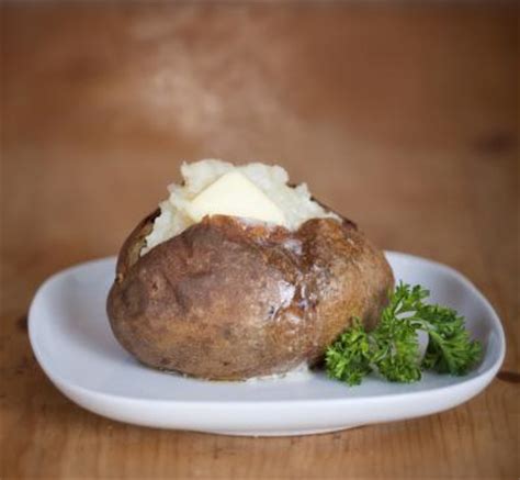 Rub the skin with olive oil, then with salt. What Temperature Do You Bake Potatoes At? | LIVESTRONG.COM