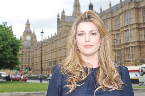 splash britain s sexiest female mp penny mordaunt to strip to her swimsuit to take part in
