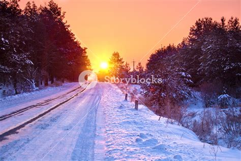 Snowy Rural Road At Sunset Royalty Free Stock Image Storyblocks
