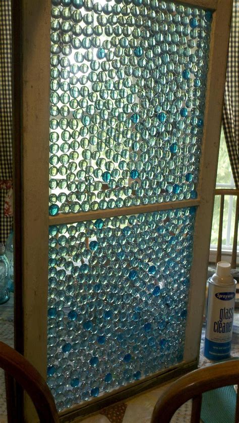 glass pebbles from the dollar store create this stain glass window look