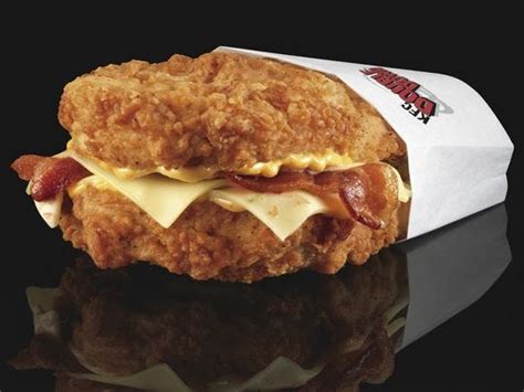 The hot dog wrapped in a fried chicken patty is currently a special promotion that's only offered in the philippines. KFC releases Double Down Dog sandwich