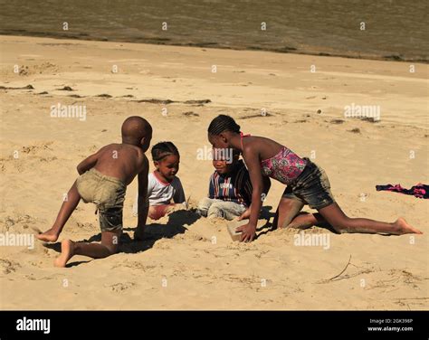 Happy Child Playing On Beach Hi Res Stock Photography And Images Alamy