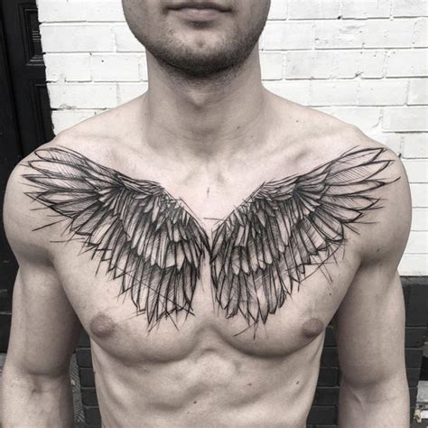 wings chest tattoo