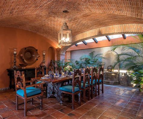 Stunning Hacienda Dining Room With Barrelled Brick Ceiling Colonial