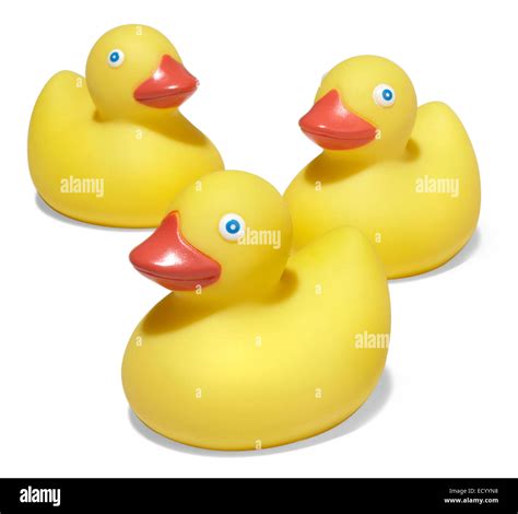 Three Rubber Duckies On White Stock Photo Alamy