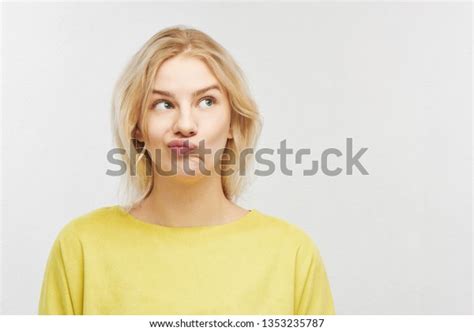 Portrait Embarrassed Young Woman Confused Mouth Stock Photo 1353235787