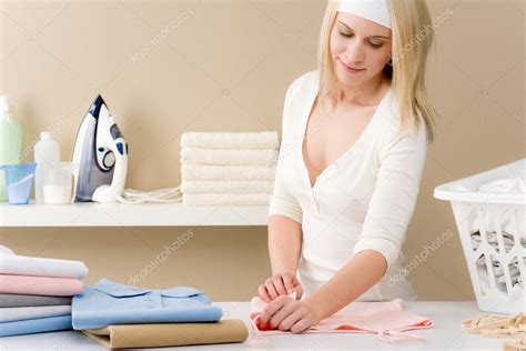 Laundry Ironing Woman Folding Clothes — Stock Photo © Candyboximages