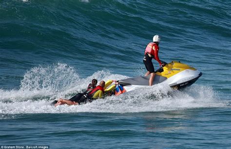 Look forward to seeing you! RNLI lifeguards on a JET SKI rescue three teens who ...