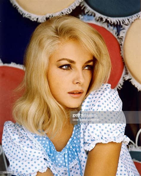 Virna Lisi Italian Actress Wearing A White Top With Blue Polka