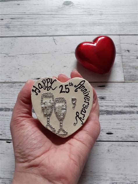 Here is a list of silver wedding anniversary gifts for parents. 25th wedding anniversary gift, silver wedding anniversary ...