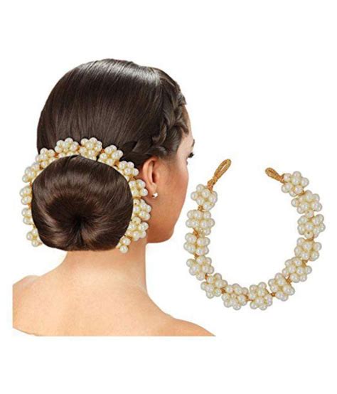 Cornrows braided into a bun. 999 GOLD White Casual Tiara Hair puff/bun accessories ...