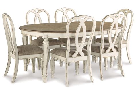 Realyn Dining Table And 6 Chairs