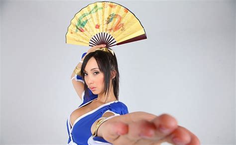 Cosplay Photo Session Of Asian Model With Big Boobs Samurai S Saber And Fan