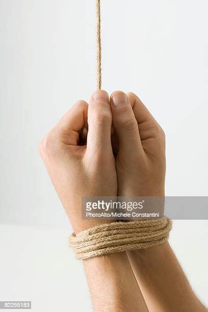 wrists tied with rope photos and premium high res pictures getty images