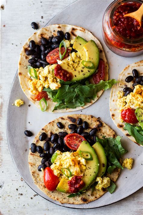 Divide cooked egg whites between the tortillas and top with tomato, avocado, spinach, and the aioli. Vegan breakfast tacos - Lazy Cat Kitchen