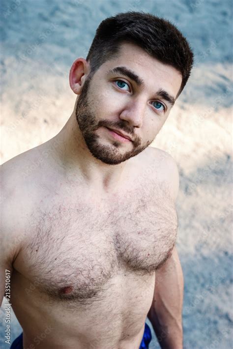 Closeup Portrait Of Sexy Shirtless Hairy Bearded Young Man With Blue Eyes Vintage Effect
