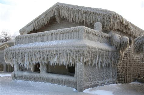 Stunning Photos Show New York Homes Covered In Ice As Blizzard Hits