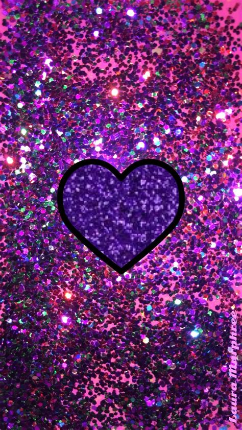 A Purple Heart Surrounded By Lots Of Glitter