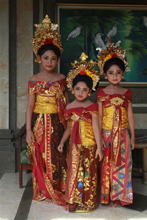 my daughter sheela wear balinese traditional costume on the mapeed ceremony in sukawati