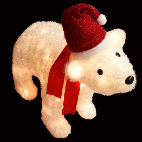 Holds a lamp which lights up and a sack with presents and a teddy bear. Polar Bear Outdoor Yard Displays | Christmas Wikii