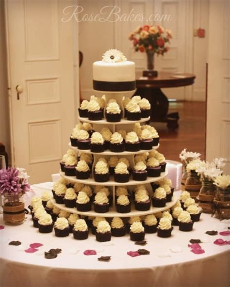 Black White And Purple Wedding Cake And Cupcake Tower