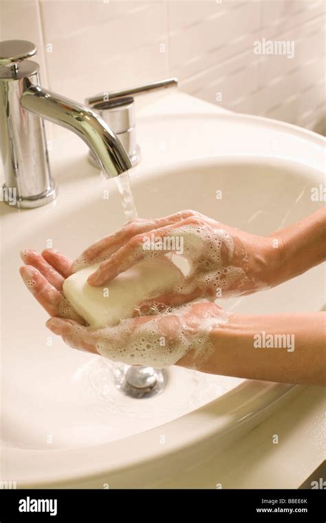 Woman Washing Her Hands Stock Photo Alamy