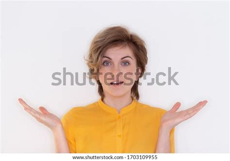 Shocked Beautiful Woman Opened Mouth Looking Stock Photo 1703109955