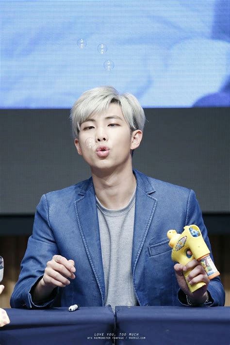 Rm's hair color is light brown and eye color is also light brown. Kim Nam Joon