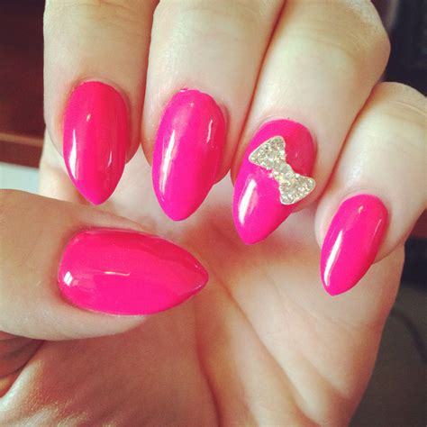 Hot Pink Gel Nails With A Rhinestone Bow Gel Nail Colors Nail Colors