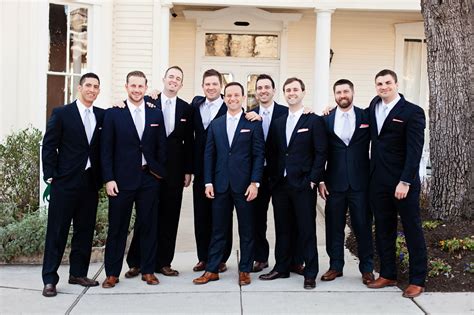 Navy Groomsmen Suits With Coral Pocket Squares