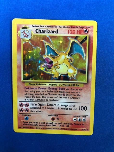 Free shipping on orders over $25 shipped by amazon. This is a holographic Charizard. From original base set. | Pokemon trading card game, Charizard ...