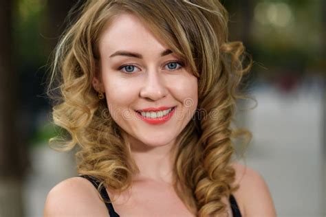 Closeup Portrait Of Young Beautiful Woman Looking At Camera Stock Image