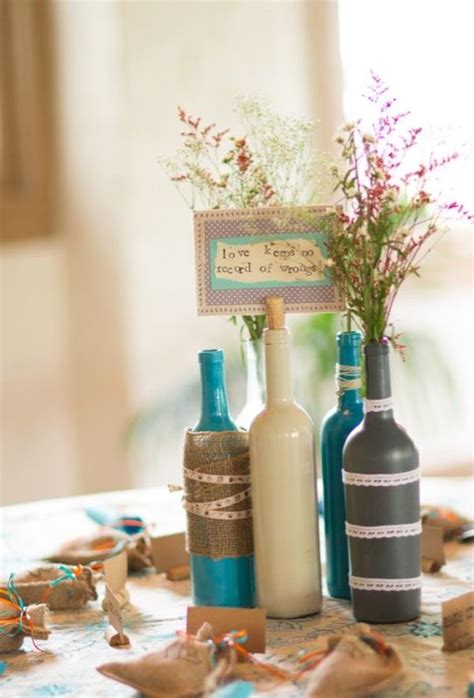 (decorate) award a mark of honor, such as a medal, to; 24 Dazzling DIY Wine Bottle Centerpieces Ideas ...