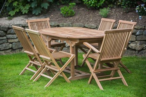16m Solid Teak Oval Pedestal Table And Folding Patio Furniture Set