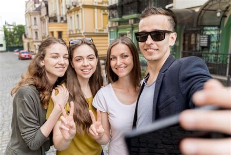 Free Photo Group Of Friends Taking Selfie Outdoor