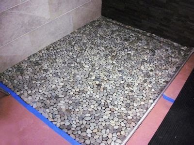 Whether it's stylish and modern, strong and bold or traditional and homely you're looking for, at stone tile company we stock a superb range of floor. How to Lay a Pebble-Tile Floor | Pebble shower floor ...