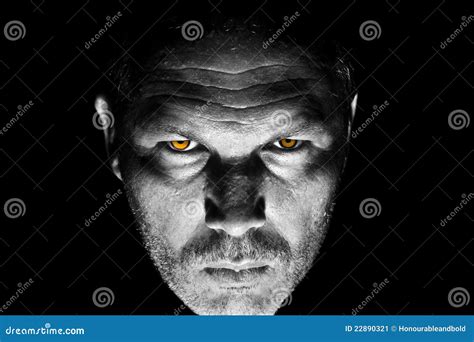 Menacing Looking Man With Orange Eyes Stock Image Image 22890321