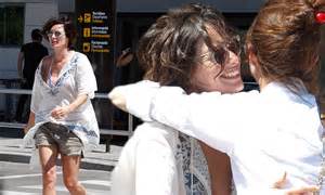 Lena Headey Flashes Cleavage As She Picks Up Pals From Ibiza Airport