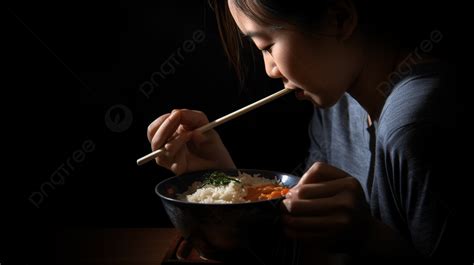 Woman Eating Bowl With Chopsticks And Rice Background A Woman Who Eats Rice A Bowl And
