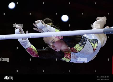 Belgian Gymnast Nina Derwael Pictured In Action During The Finals Of The Uneven Bars Event At