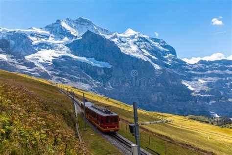 Train Running Under The Jungfrau Stock Image Image Of Monch Rail
